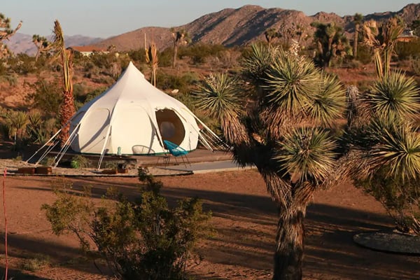 Joshua Tree Glamping Yurt at Joshua Tree Houses view of tent in desert